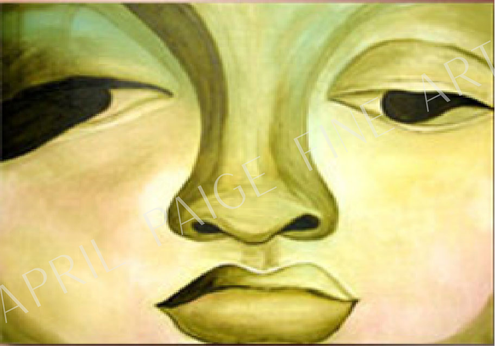 Close-up of a gold mask with a blurred background