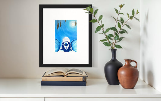 Framed artwork on a shelf with books and vases