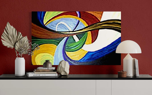 Abstract painting on a wall with decorative items below