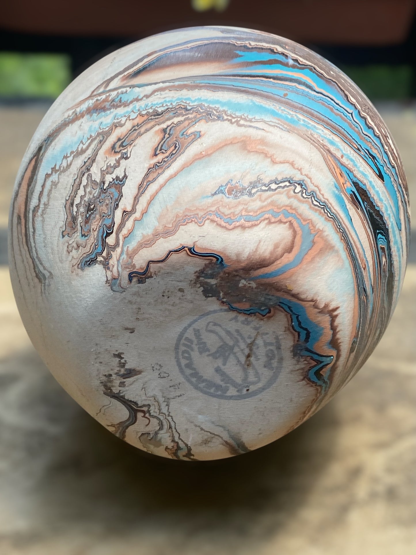 Marbled stone with swirling patterns on a neutral background