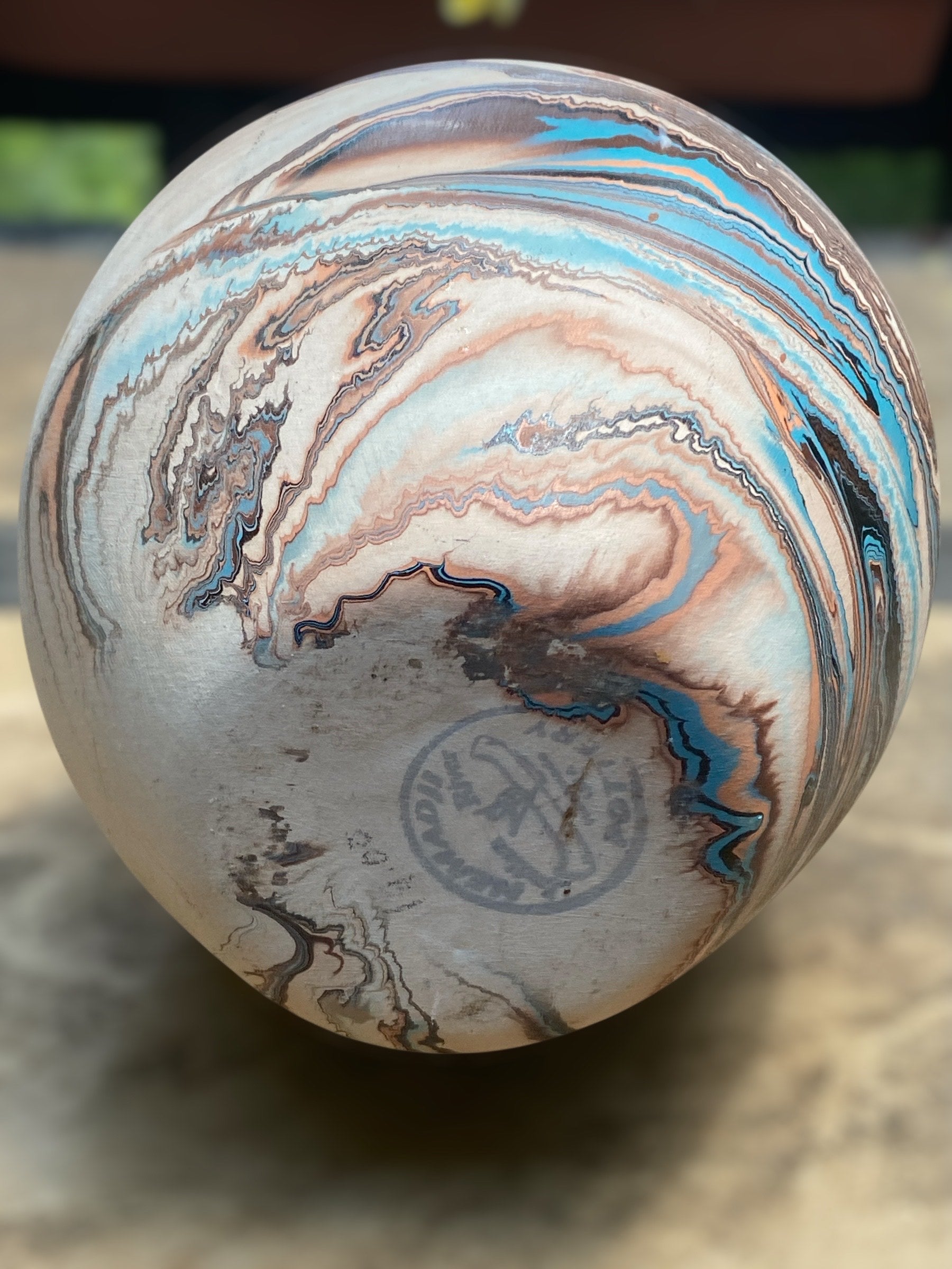 Marbled stone with swirling patterns on a neutral background