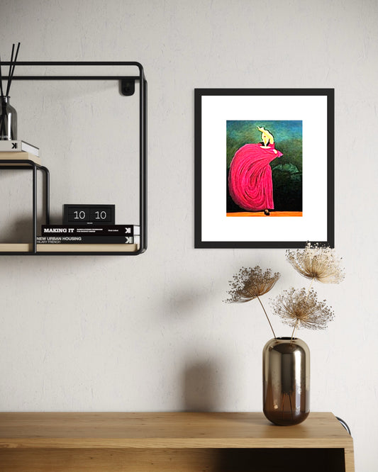Framed artwork on a wall above a wooden shelf with decorative elements.