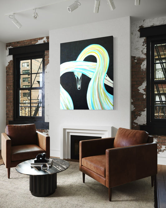 Modern living room with brown leather chairs, a coffee table, and abstract artwork on the wall.