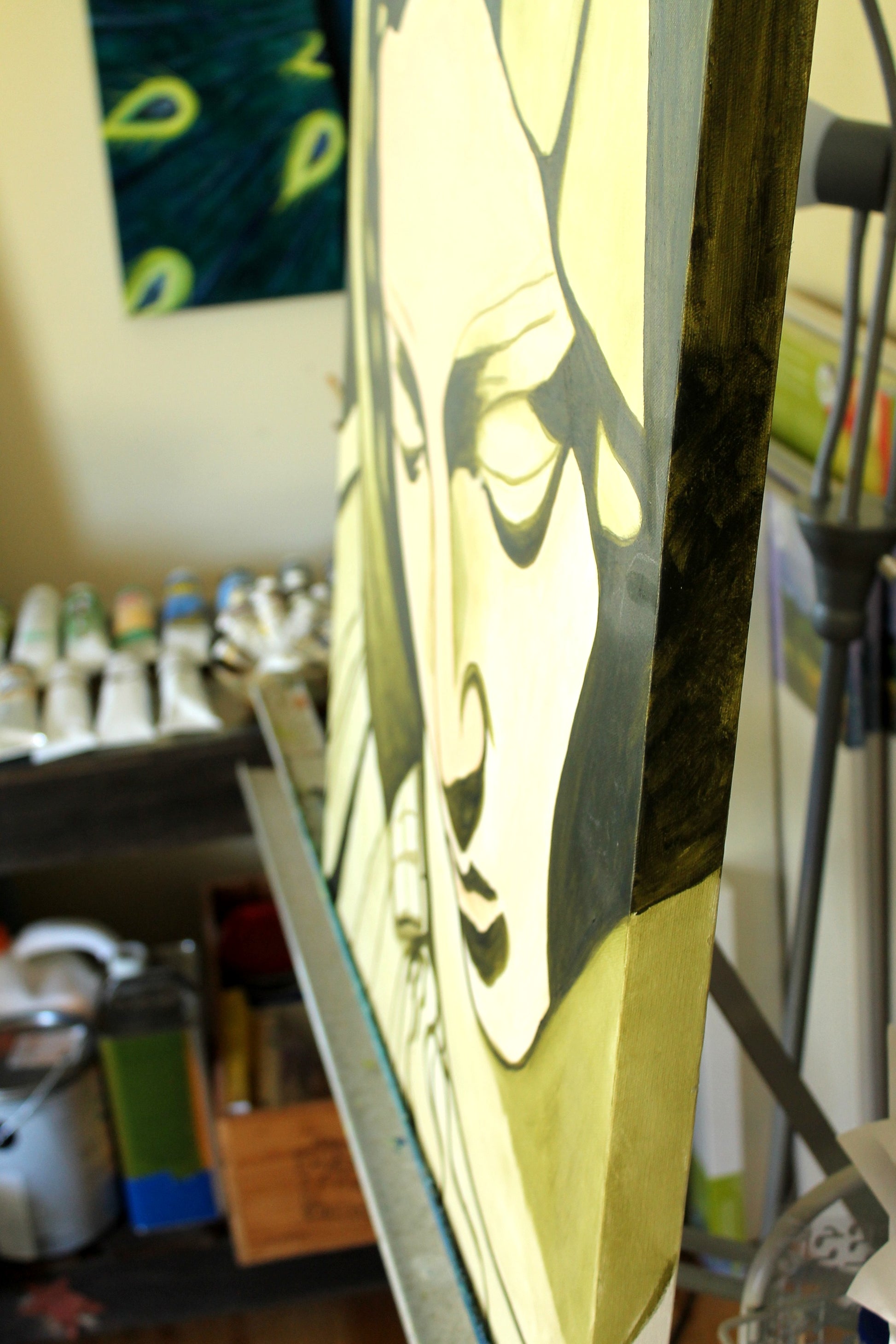 Close-up of a framed artwork with a blurred background