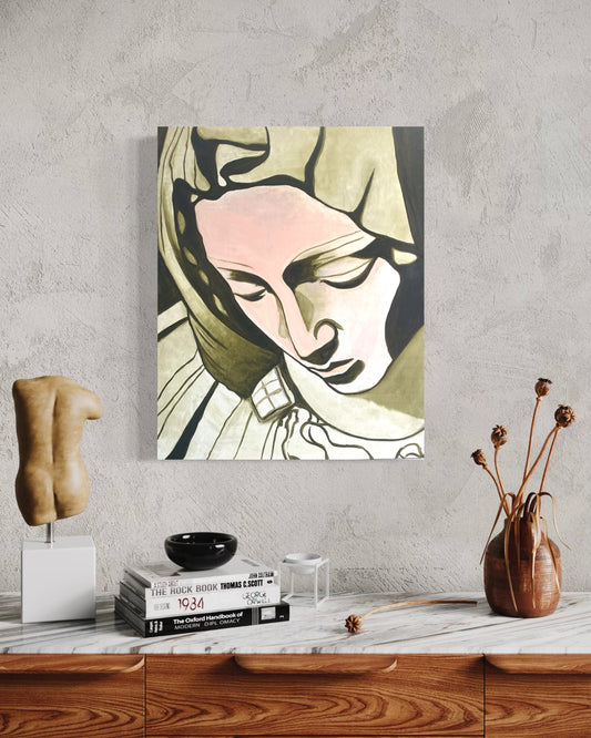 Artistic depiction of a woman's face on a wall above a wooden surface with decorative items.