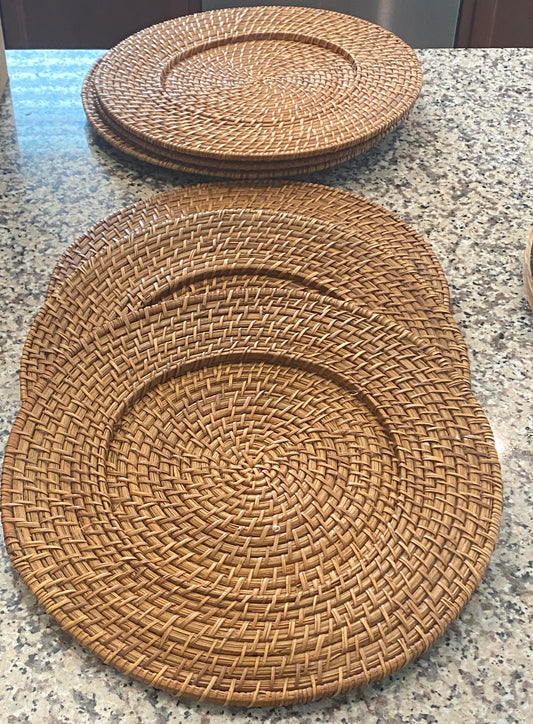 Three woven placemats on a granite countertop