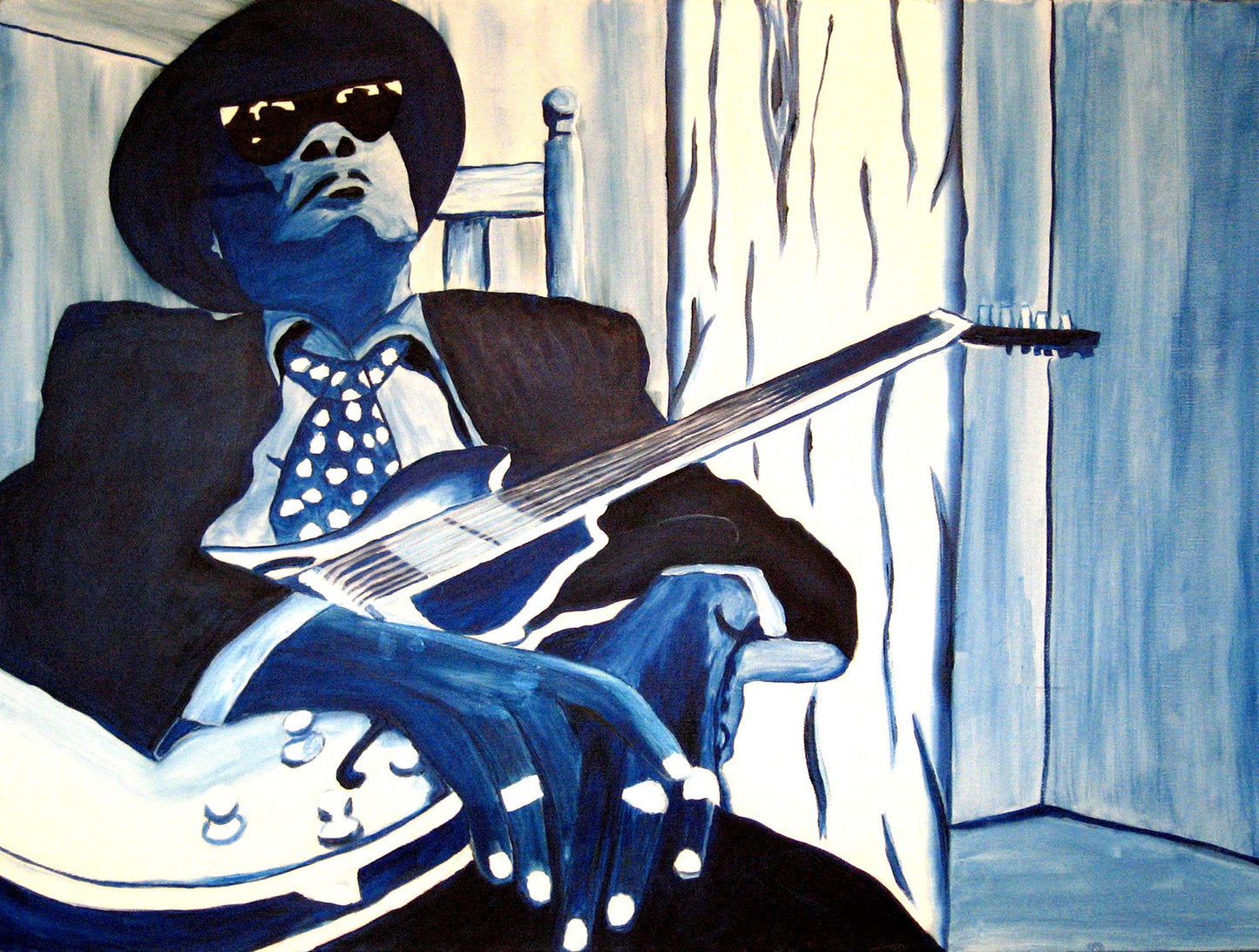 Person playing guitar with a blue tint, wearing sunglasses and a dark outfit.